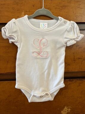 White Baby One-Piece with Pink Monogram L